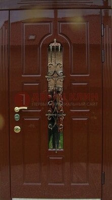 Красивая металлическая дверь со стеклом и ковкой ДСК-33 в Фрязино